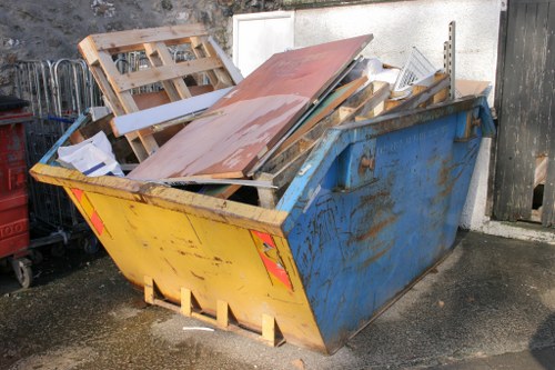 Team removing furniture from a Bayswater flat